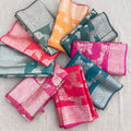 Shimmer organza sarees with silver zari floral border in nine colours