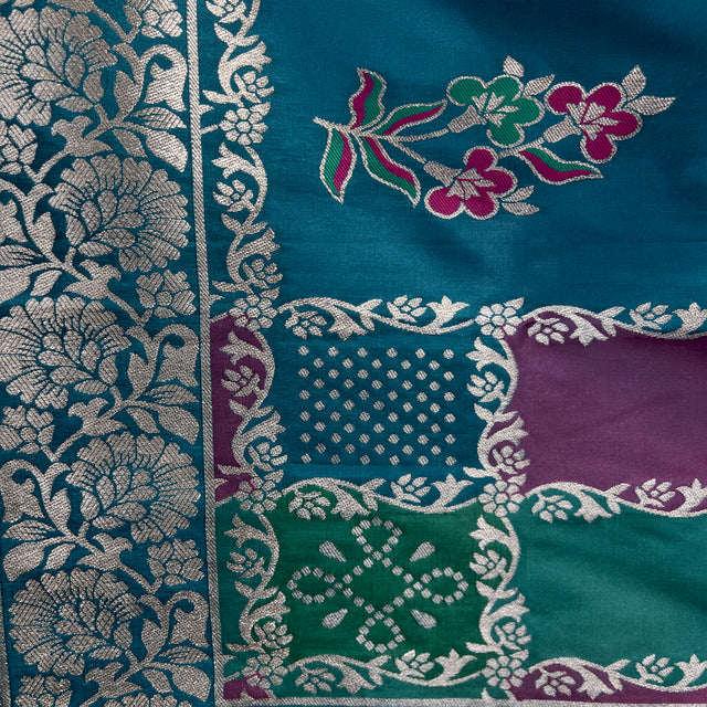 Teal silk patchwork detail with silver zari florals and multicolor accents