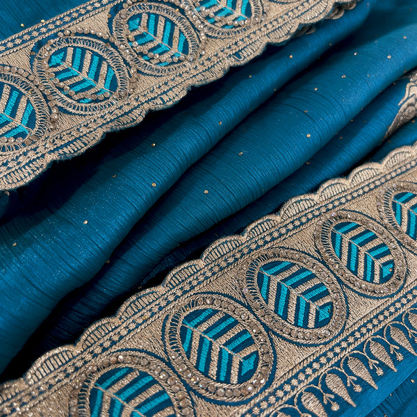 Teal fabric with ornate gold zari and stonework band border detail
