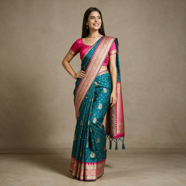 Teal Blue Banarasi Art Silk Saree with Zari Butas & Rani Pink Temple Border, worn by a model