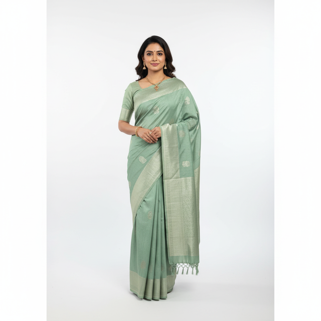 Sage green saree draped on model with contrasting woven pallu and motif border