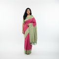 Contrast pallu woven saree in pink and sage green, tassel border and drape