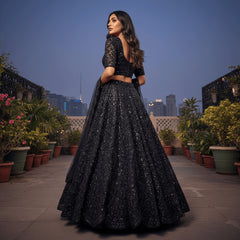 Black embellished lehenga choli set with beadwork blouse and flared skirt