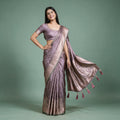 Satin Gifting Saree with Zari Paisley Border in mauve, worn by a model