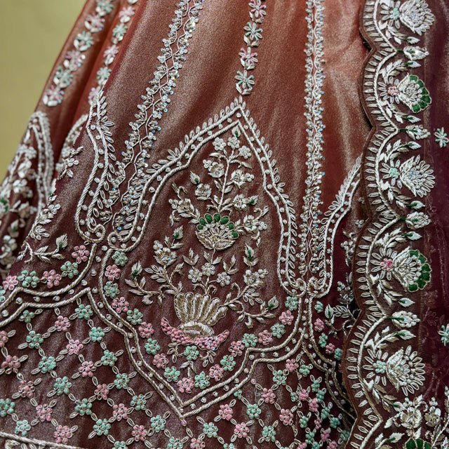 Embroidered ombre fabric with silver zardosi vines, floral motifs, and teal accents